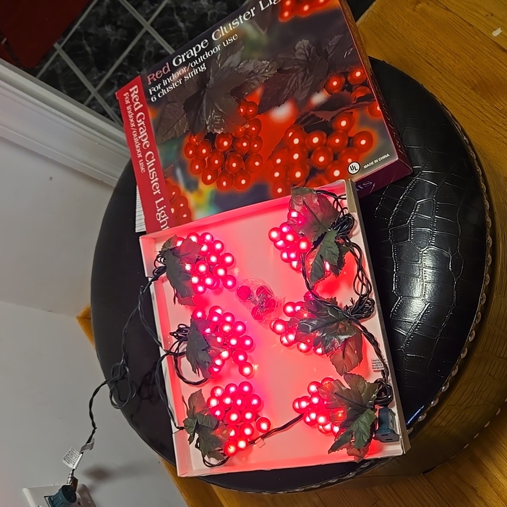 Lighted red grape cluster